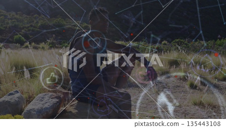 Sitting hiker resting on rock at mountain path, backpack hiking boots digital overlay Sitting hiker resting on rock at mountain path, backpack hiking boots digital overlay 135443108
