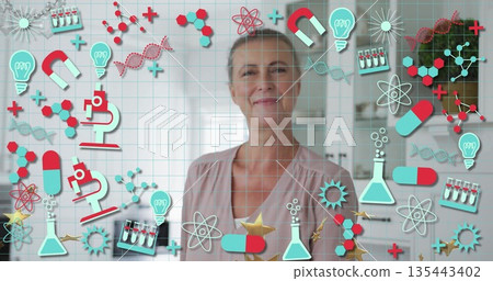 Smiling senior woman wearing light blouse standing in modern kitchen, with science icons overlay Smiling senior woman wearing light blouse standing in modern kitchen, with science icons overlay 135443402