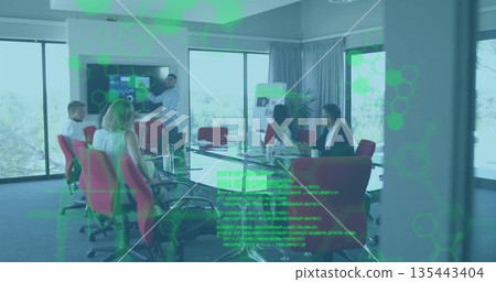 Pointing businessman presenting charts in conference room, with laptops coffee mugs flip chart Pointing businessman presenting charts in conference room, with laptops coffee mugs flip chart 135443404