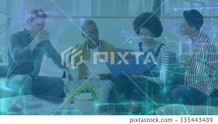 Discussing ideas, four coworkers holding mugs and documents in office lounge, with circuit graphics Discussing ideas, four coworkers holding mugs and documents in office lounge, with circuit graphics 135443489