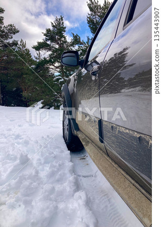 Pristine winter mountain views reveal snow-covered peaks and untouched alpine landscapes in the Sierra Nevada, Spain. 135443907