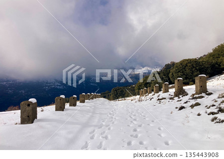 Pristine winter mountain views reveal snow-covered peaks and untouched alpine landscapes in the Sierra Nevada, Spain. Pristine winter mountain views reveal snow-covered peaks and untouched alpine landscapes in the Sierra Nevada, Spain. 135443908