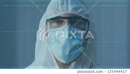 Laboratory technician analyzing log overlay in cleanroom, wearing hood coverall mask and goggles Laboratory technician analyzing log overlay in cleanroom, wearing hood coverall mask and goggles 135444417