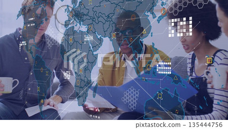 Discussing team of colleagues reviewing reports in office lounge, with mugs, binder, data overlay 135444756