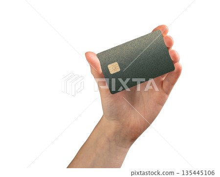 Bank card in hand client close up. Plastic chip for payment, purchase and shopping commerce. Finance Bank card in hand client close up. Plastic chip for payment, purchase and shopping commerce. Finance 135445106