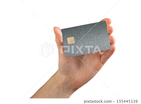 Bank card in hand plastic close up. Chip payment for shopping, purchase and commerce trade. Finance 135445139