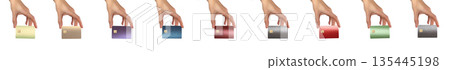 Hands holding bank credit cards of different colors, set isolated on white background. Hands holding bank credit cards of different colors, set isolated on white background. 135445198