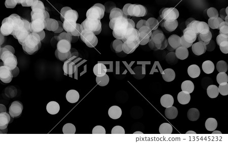 Light bokeh blur with black and white glow. Shiny circular pattern with dots, sparkle and soft 135445232