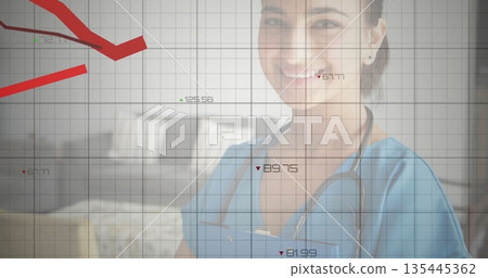 Standing provider in blue scrubs with stethoscope in clinic, grid overlay showing red arrow graph 135445362