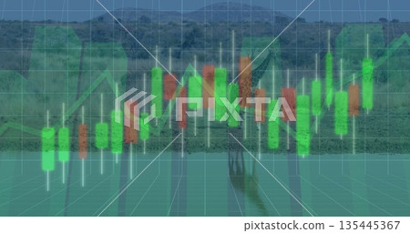 Standing adult elephant raising trunk at riverside channel with green red candlestick bars and grid 135445367