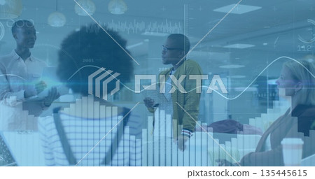 Presenting man in chartreuse bomber jacket leading discussion at office with analytics overlay 135445615