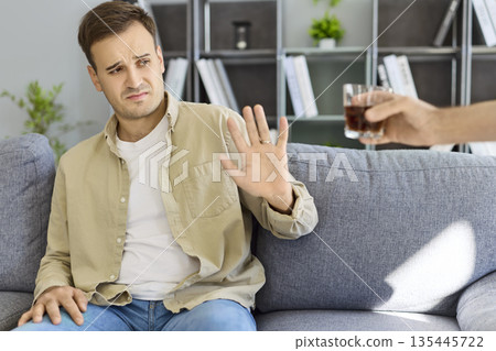 Stop gesture of man to hand giving alcohol drink glass, anti addiction campaign Stop gesture of man to hand giving alcohol drink glass, anti addiction campaign 135445722