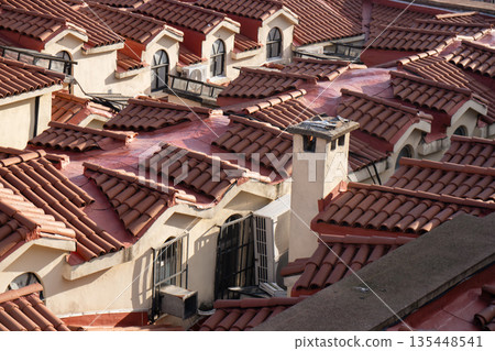 Roofs, China, Housing: Dense Red Tile Rooftops, Residential Area, Modern Development. Roofs, China, Housing: Dense Red Tile Rooftops, Residential Area, Modern Development. 135448541