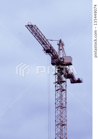Construction High Altitude Tower Crane Isolated Over Blue Sky Background Construction High Altitude Tower Crane Isolated Over Blue Sky Background 135449074