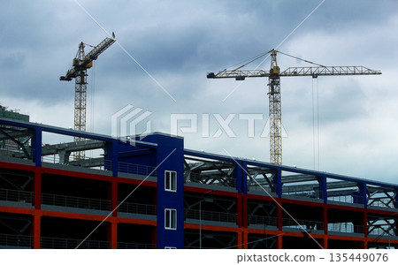 Cranes At Construction Of Multi Storey Block Of Flat Building  135449076
