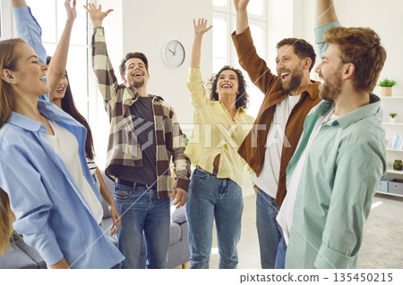 Group of excited happy friends students or colleagues having fun hanging together. Group of excited happy friends students or colleagues having fun hanging together. 135450215