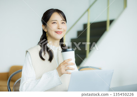 Business woman who works in a cafe 135450226
