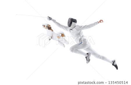 Fencer lunging with sword alongside jumping dog composition. 135450514
