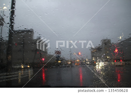 Window glass wet in the rain 135450628