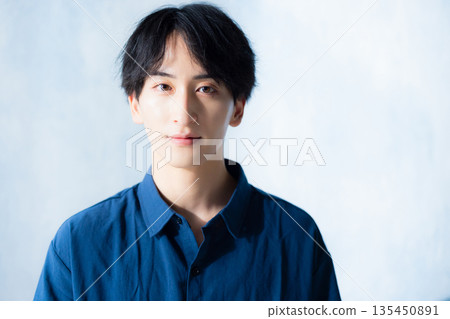 A man in a navy shirt 135450891