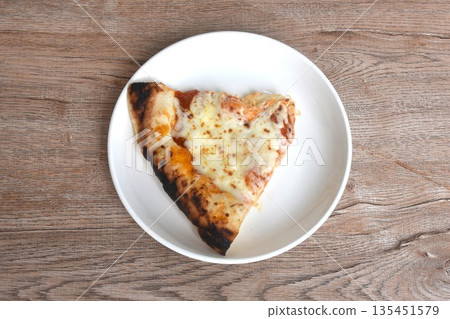 piece of baking homemade cheese pizza dressing tomato sauce on plate piece of baking homemade cheese pizza dressing tomato sauce on plate 135451579