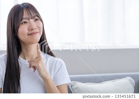  Thinking young lady 135451671