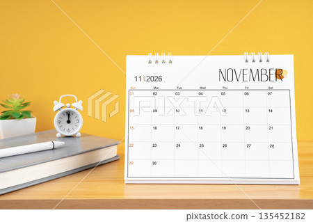 November desk calendar for 2026 year on work table. 135452182