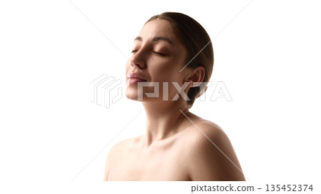 Female portrait with closed eyes and bare shoulders. 135452374