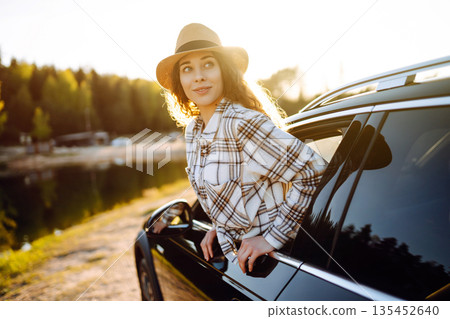 Road trip travel, woman and car window freedom to relax in summer, outdoor adventure. Active life. Road trip travel, woman and car window freedom to relax in summer, outdoor adventure. Active life. 135452640