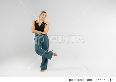 Businesswoman showing something with hand on white background Businesswoman showing something with hand on white background 135452918