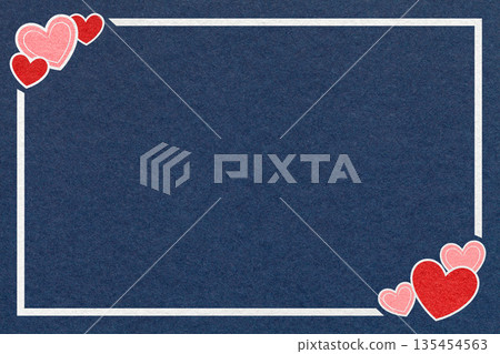 Valentines Day dark blue romantic background from textured paper with red hearts, white frame and copy space for banner 135454563