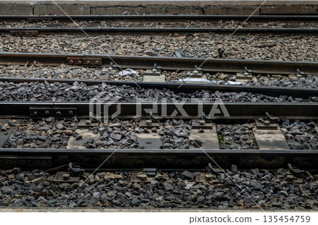Railroad crossing through in railway station. Railroad crossing through in railway station. 135454759