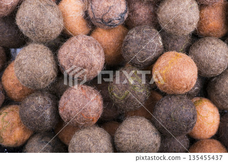 Background of multi-colored balls of wool felted Background of multi-colored balls of wool felted 135455437