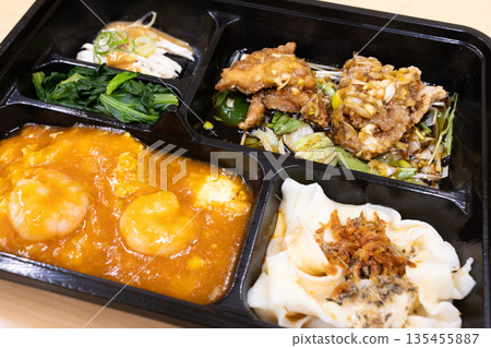 Delicious Chinese bento, shrimp chili and fried chicken bento Delicious Chinese bento, shrimp chili and fried chicken bento 135455887