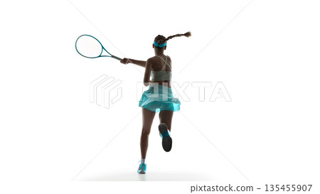 Female tennis player back view sprinting during match isolated on white. Female tennis player back view sprinting during match isolated on white. 135455907