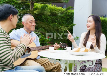 Asian multi generations family. 135456398