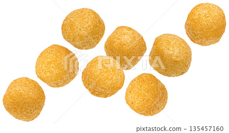 Falling crispy corn balls, crunchy texture with salted coating isolated on white background, full depth of field Falling crispy corn balls, crunchy texture with salted coating isolated on white background, full depth of field 135457160