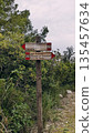 Wooden hiking trail signpost  135457634