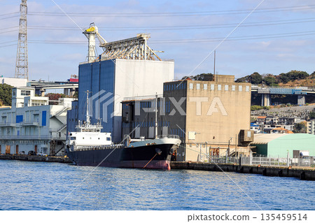 Cargo transportation and activity at Mojiko shipping terminal in Kitakyushu, Japan. 135459514
