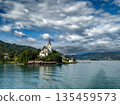 Small Church On Peninsula Of Village Maria Woerth At Lake Woerthersee In Carinthia, Austria 135459573