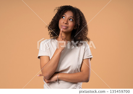 Thoughtful Around African Teen School Student Girl, Weighing Options. Puzzled Thoughtful Around African Teen School Student Girl, Weighing Options. Puzzled 135459700