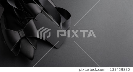 Black Pointed-Toe Shoes with Satin Bows and Blank Tag. Luxury Fashion Flatlay for Black Friday Promotion 135459880