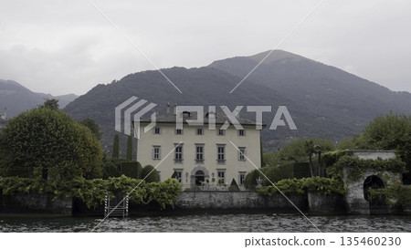 Stunning Lakeside Villa Set in a Beautiful Landscape Surrounded by Majestic Mountains. Action 135460230