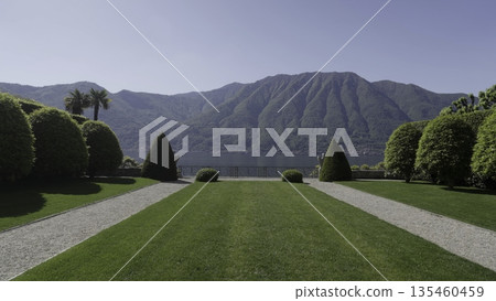 Breathtaking lake como landscape from villa melzi gardens. Action Breathtaking lake como landscape from villa melzi gardens. Action 135460459