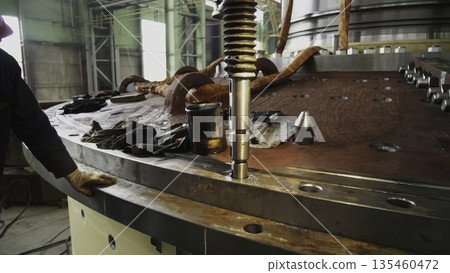 Industrial equipment assembly: aligning components with precision. Stock clip Industrial equipment assembly: aligning components with precision. Stock clip 135460472