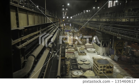 Steel mill interior showing industrial manufacturing process. Stock clip Steel mill interior showing industrial manufacturing process. Stock clip 135460617