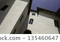 Majestic white building with intricate architecture under blue sky. Action 135460647