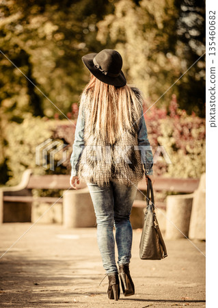 Back view of stylish woman on air 135460682
