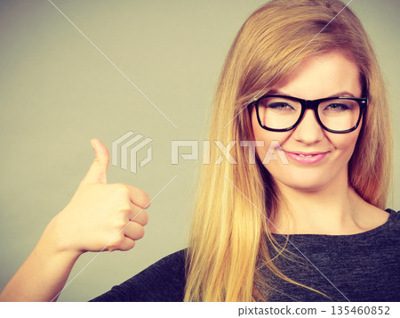 Portrait of happy blonde woman smiling with joy Portrait of happy blonde woman smiling with joy 135460852