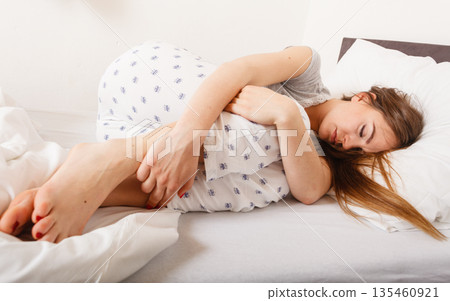 Tired girl sleeping. 135460921